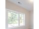 A window in a room that lets in natural light, showing the outdoor scenery at 1991 Deco Dr, Kennesaw, GA 30144