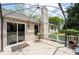 Back patio with a pergola offers an outdoor seating area overlooking the yard at 217 Colemans Bluff Dr, Woodstock, GA 30188