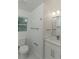 This remodeled bathroom features a new vanity, fixtures, mirror, and towel bars, with a window for natural light at 2720 Cavalier Dr, Decatur, GA 30034