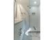 Bathroom with a glass enclosed walk-in shower, quartz countertops, and modern fixtures at 2720 Cavalier Dr, Decatur, GA 30034