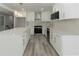 Updated kitchen features white cabinets, quartz countertops, subway tile backsplash and stainless steel appliances at 2720 Cavalier Dr, Decatur, GA 30034