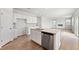Stylish kitchen featuring granite countertops, stainless appliances, and an open floor plan at 7133 Brushwood Bend (Lot 43), Lithonia, GA 30058