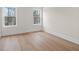 Bedroom featuring natural light, fresh paint, and modern floors at 11350 Bennett Ln, Johns Creek, GA 30097