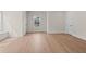 Bright bedroom with neutral paint and luxury vinyl plank flooring at 11350 Bennett Ln, Johns Creek, GA 30097
