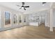 Bright and airy living room connected to a modern kitchen at 11350 Bennett Ln, Johns Creek, GA 30097