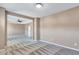 Bright bedroom with carpet, a tray ceiling, recessed lighting, and connection to other rooms for functional flow at 385 Hinton Chase Pkwy, Covington, GA 30016