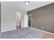 Spacious bedroom with neutral walls and plush carpeting, perfect for comfort and relaxation at 385 Hinton Chase Pkwy, Covington, GA 30016