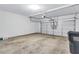Spacious two-car garage with an automatic door and room for parking and storage at 385 Hinton Chase Pkwy, Covington, GA 30016