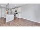 Well-lit kitchen with stainless appliances and large island at 385 Hinton Chase Pkwy, Covington, GA 30016