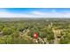 Aerial view of a neighborhood surrounded by lush greenery and trees at 4067 Silver Fir Ct, Marietta, GA 30066