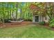Charming backyard with a small shed and hammock for relaxation at 4067 Silver Fir Ct, Marietta, GA 30066