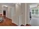 Hallway featuring beautiful hardwood floors that lead to a bedroom at 4067 Silver Fir Ct, Marietta, GA 30066