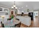 Open layout kitchen with a breakfast nook and granite countertops at 4067 Silver Fir Ct, Marietta, GA 30066