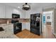 Well-equipped kitchen with stainless steel appliances, granite countertops, and ample cabinet space at 4067 Silver Fir Ct, Marietta, GA 30066