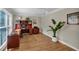 Bright home office with hardwood floors, large window, built-in desk, and ample natural light at 4067 Silver Fir Ct, Marietta, GA 30066