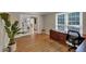 Functional home office with hardwood floors, bright window, classic desk, and easy access to other rooms at 4067 Silver Fir Ct, Marietta, GA 30066