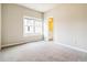 Bright bedroom offers plush carpet, a window, and ensuite bathroom access at 510 Suwanee Pass Ln, Suwanee, GA 30024