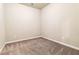 Carpeted bedroom offering neutral walls, baseboard trim, and electrical outlets at 510 Suwanee Pass Ln, Suwanee, GA 30024