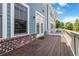 Back deck area with entry to home with brick facade at 510 Suwanee Pass Ln, Suwanee, GA 30024