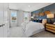 Stylish main bedroom featuring a queen bed, with two windows that allow natural light into the room at 7145 Brushwood Bend - Lot 41, Lithonia, GA 30058