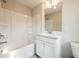 Bright bathroom with neutral colors, tub/shower combo, and modern vanity at 1903 Deco Dr, Kennesaw, GA 30144