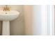 Bathroom with a pedestal sink and modern fixtures at 1903 Deco Dr, Kennesaw, GA 30144