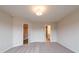 Bedroom with carpeted floors and a bathroom, closet through double doors offer practical space at 1903 Deco Dr, Kennesaw, GA 30144