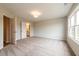 Bright bedroom with large windows, and ensuite bathroom entrance at 1903 Deco Dr, Kennesaw, GA 30144