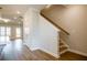 View of staircase and hallway featuring hardwood floors and neutral wall colors at 1903 Deco Dr, Kennesaw, GA 30144