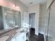 Spacious bathroom featuring a double sink vanity, walk-in shower, and bright lighting at 3076 Quantum Ln, Atlanta, GA 30341
