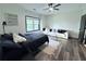 Relaxing bedroom with natural light, ceiling fan, and modern decor at 3076 Quantum Ln, Atlanta, GA 30341