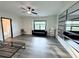 Spacious bedroom with a modern design, large window, ceiling fan and an ensuite bath at 3076 Quantum Ln, Atlanta, GA 30341