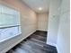 Spacious walk-in closet featuring custom shelving and dark wood-style flooring at 3076 Quantum Ln, Atlanta, GA 30341