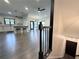 View of the open-concept living room and kitchen from the staircase at 3076 Quantum Ln, Atlanta, GA 30341