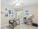 Office with a window that lets in natural light, decorated with various photographs at 4545 Evandale Way, Cumming, GA 30040