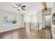 Open living space with vaulted ceiling, modern lighting, and ample natural light at 875 Waterbrook Ct, Roswell, GA 30076