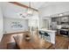 Open concept living room and kitchen area with hardwood floors and great natural light at 875 Waterbrook Ct, Roswell, GA 30076