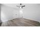Bedroom featuring ceiling fan, spacious closet and modern flooring at 1031 Abercorn Way, Douglasville, GA 30134