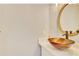 Stylish bathroom featuring a unique vessel sink and modern faucet, blending form and function at 2457 Birkhall Way, Lawrenceville, GA 30043