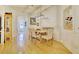 Bright dining room with wood floors, modern light fixture, and stylish decor at 2457 Birkhall Way, Lawrenceville, GA 30043