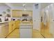 Modern kitchen with stainless steel appliances, granite countertops, and center island at 2457 Birkhall Way, Lawrenceville, GA 30043
