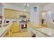 Modern kitchen with stainless steel appliances, granite countertops, and center island at 2457 Birkhall Way, Lawrenceville, GA 30043