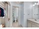 Well-lit bathroom with a single vanity, tile flooring, and a separate toilet room for added privacy at 486 Milledge Gate Se Ter, Marietta, GA 30067