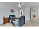 Comfortable bedroom featuring a single bed, a ceiling fan, and access to an ensuite bathroom at 486 Milledge Gate Se Ter, Marietta, GA 30067