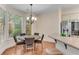 Bright breakfast nook with large windows provides natural light and views of the back yard at 486 Milledge Gate Se Ter, Marietta, GA 30067