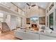 Spacious living room boasts a fireplace, built-in shelves, and a second story open staircase at 486 Milledge Gate Se Ter, Marietta, GA 30067