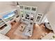 Bright living room with a fireplace and large windows overlooking the outdoor patio at 486 Milledge Gate Se Ter, Marietta, GA 30067