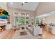 Bright living room includes a fireplace, backyard access, and is open to the breakfast nook at 486 Milledge Gate Se Ter, Marietta, GA 30067