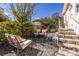 Backyard with gravel, patio furniture, and landscaped surroundings at 69 Randolph Ne St, Atlanta, GA 30312