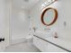 Bright bathroom with tub, toilet, and modern vessel sink vanity at 69 Randolph Ne St, Atlanta, GA 30312